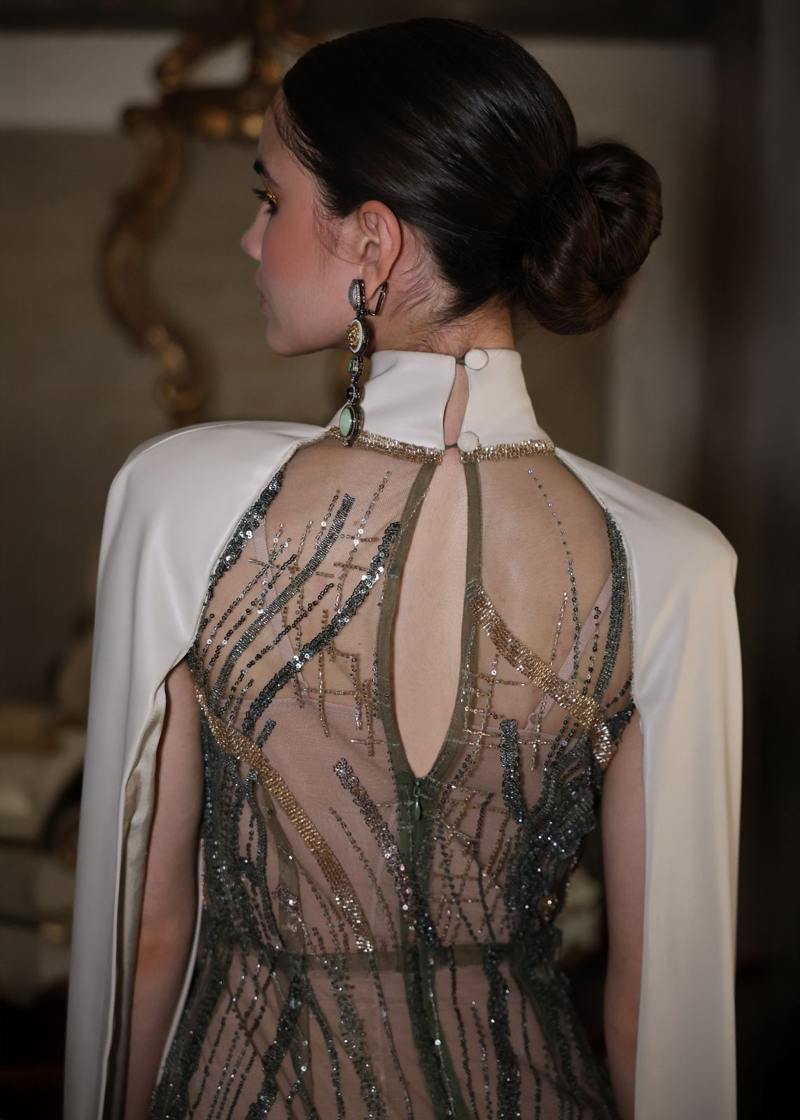 High-Slit Embroidered Net Gown with Off-White Vegan Leather Shoulder Cape