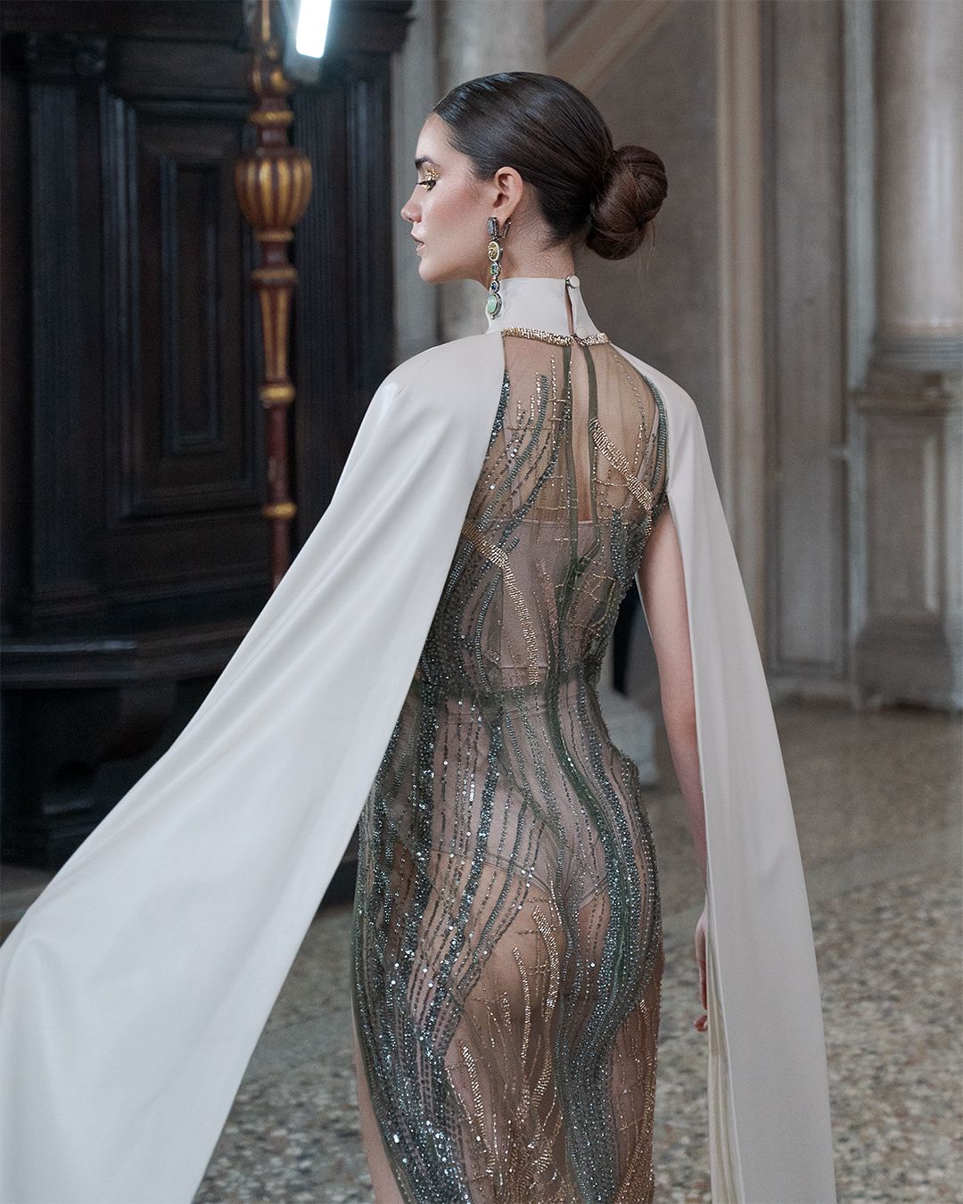 High-Slit Embroidered Net Gown with Off-White Vegan Leather Shoulder Cape